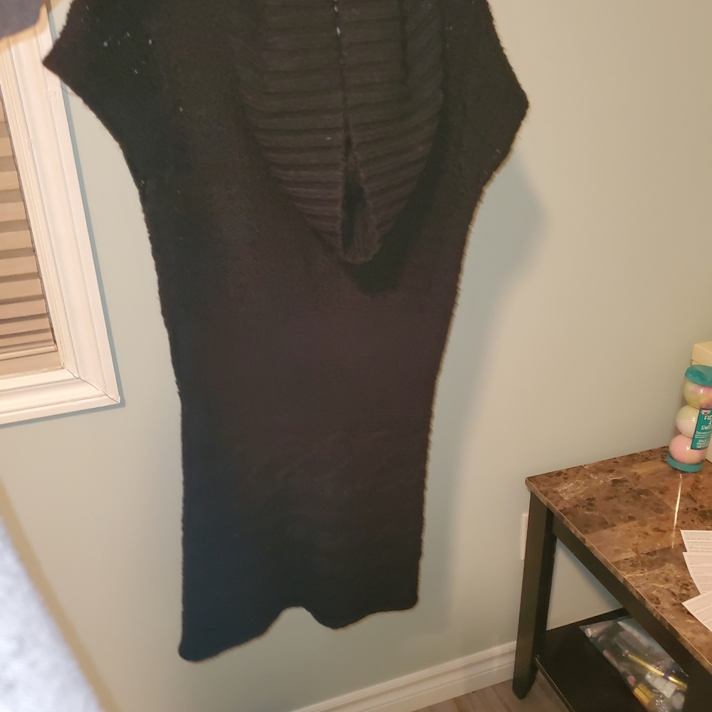 Long  sleeveless sweater
